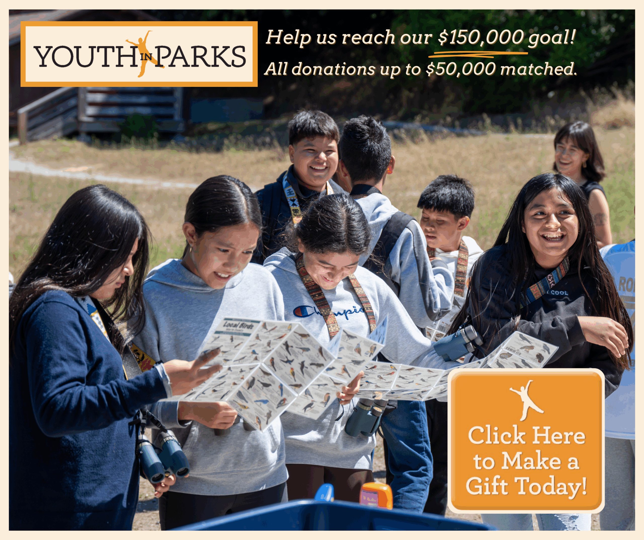 A group of youth outdoors smile and look at bird guides. Text reads "Youth in Parks" and "Help us reach our $150,000 goal! All donations up to $50,000 matched."
