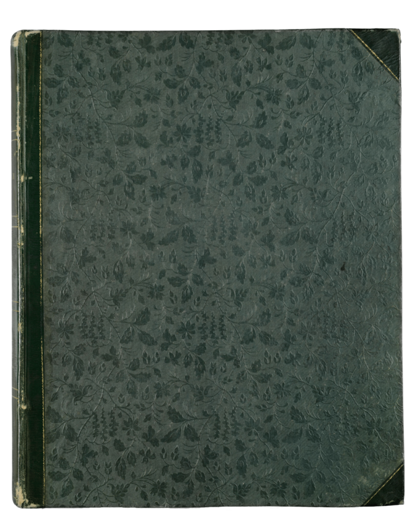 A green book with a floral cloth casing.